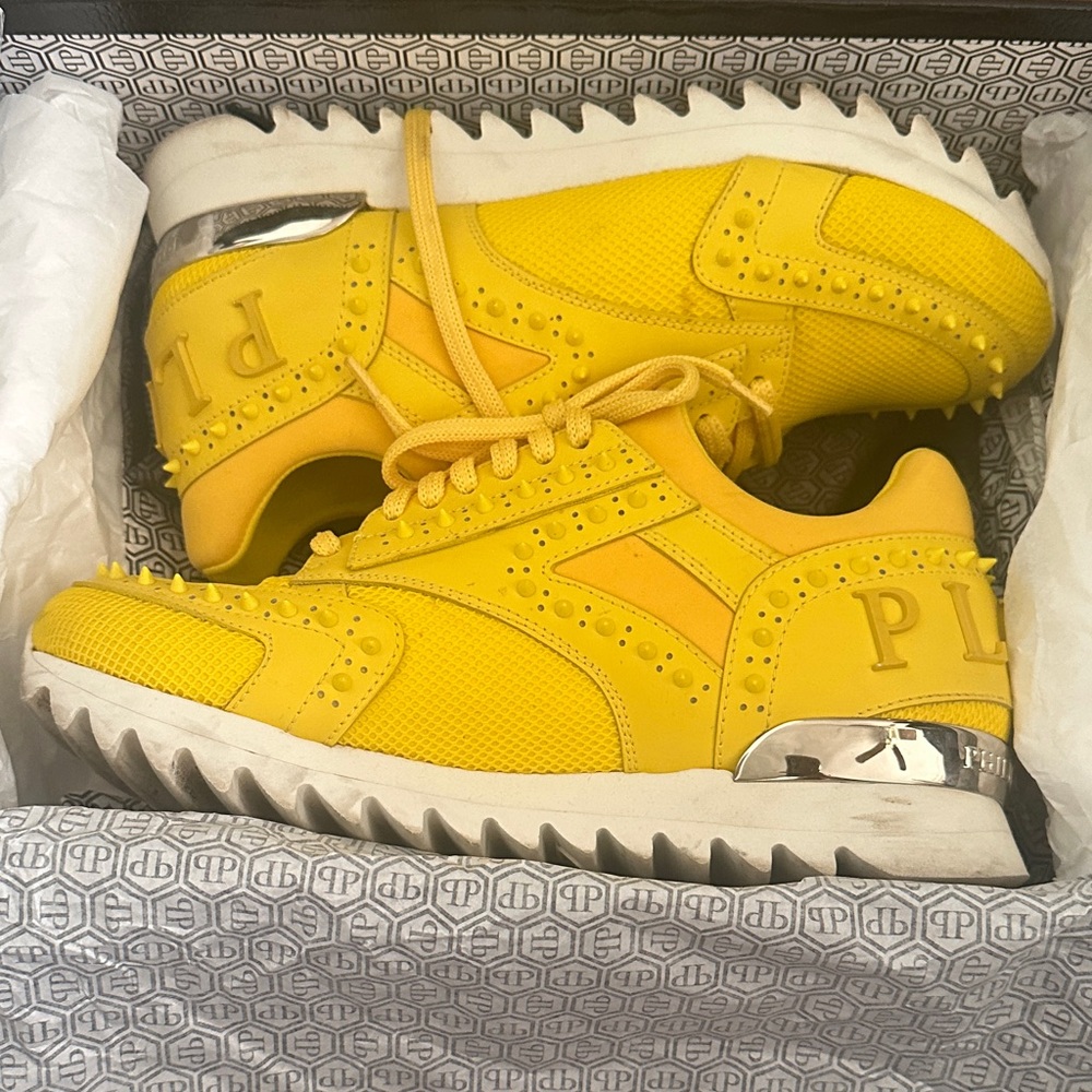 Yellow Studded Sneakers with Silver Accents
Phillip plein